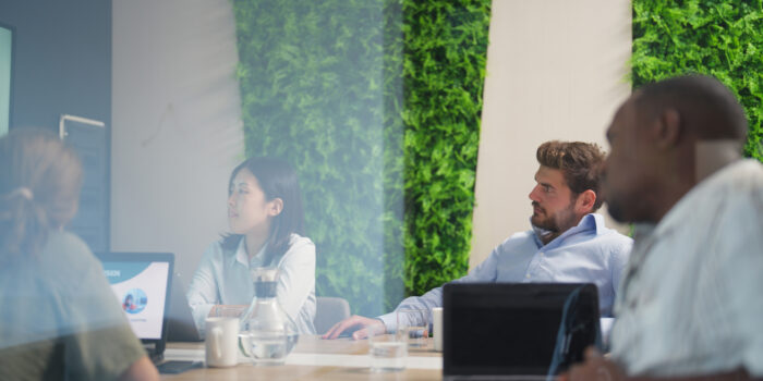 Business people having business meeting in meeting room in modern office working space