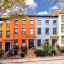 Global Housing Strategy Guide cover with an image of colorful row houses